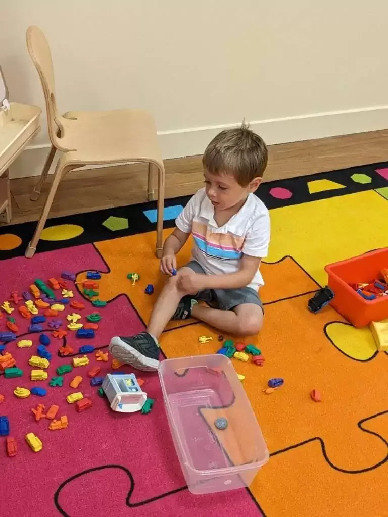 A joyful moment in the classroom at Blossom Station
