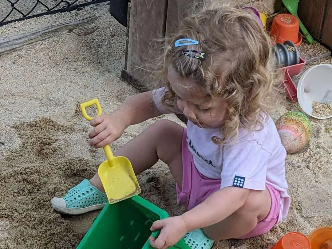 Children enjoying outdoor play through the TimberNook program at Blossom Station